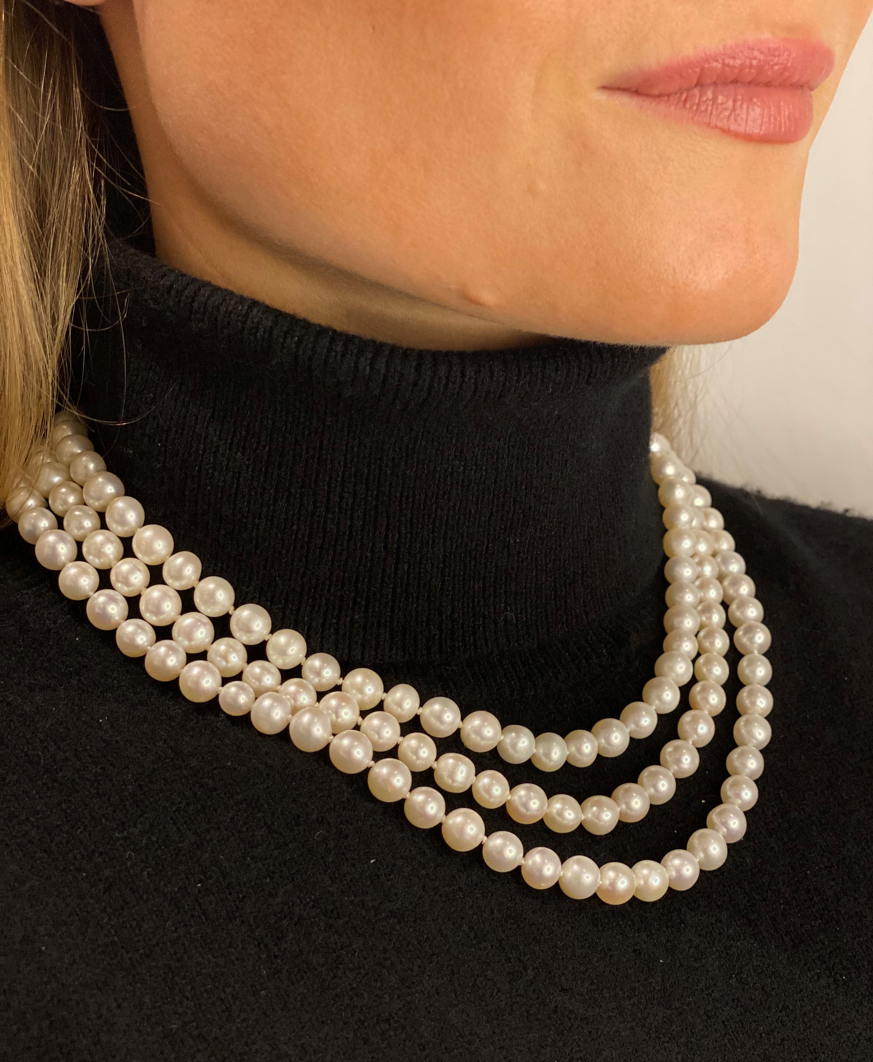 Three-row Japanese saltwater pearl set with silver clasp